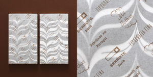 Mil Folhas, mit feinem edlen Papier verpackt